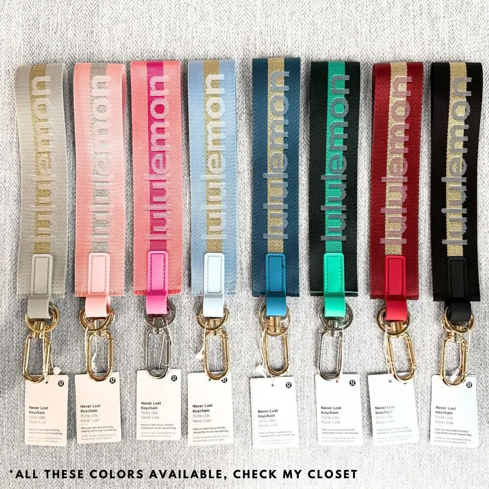 NEW Lululemon Never lost Keychain Wordmark Baby Blue Gold